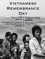 In a black-and-white photograph below black text, six people sit in what appears to be a boat, with water and sky in the background.